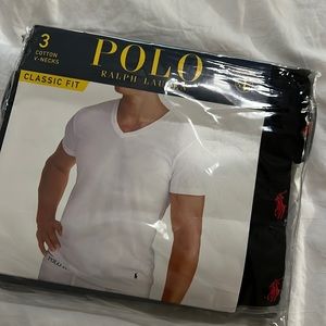 Package of black polo Ralph Lauren shirts